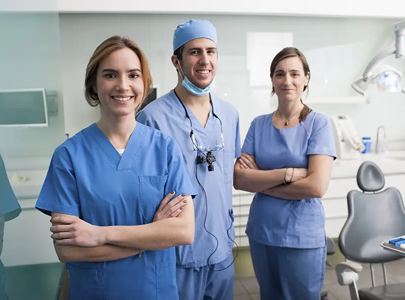 Smile Makers dental professionals in scrubs at the practice